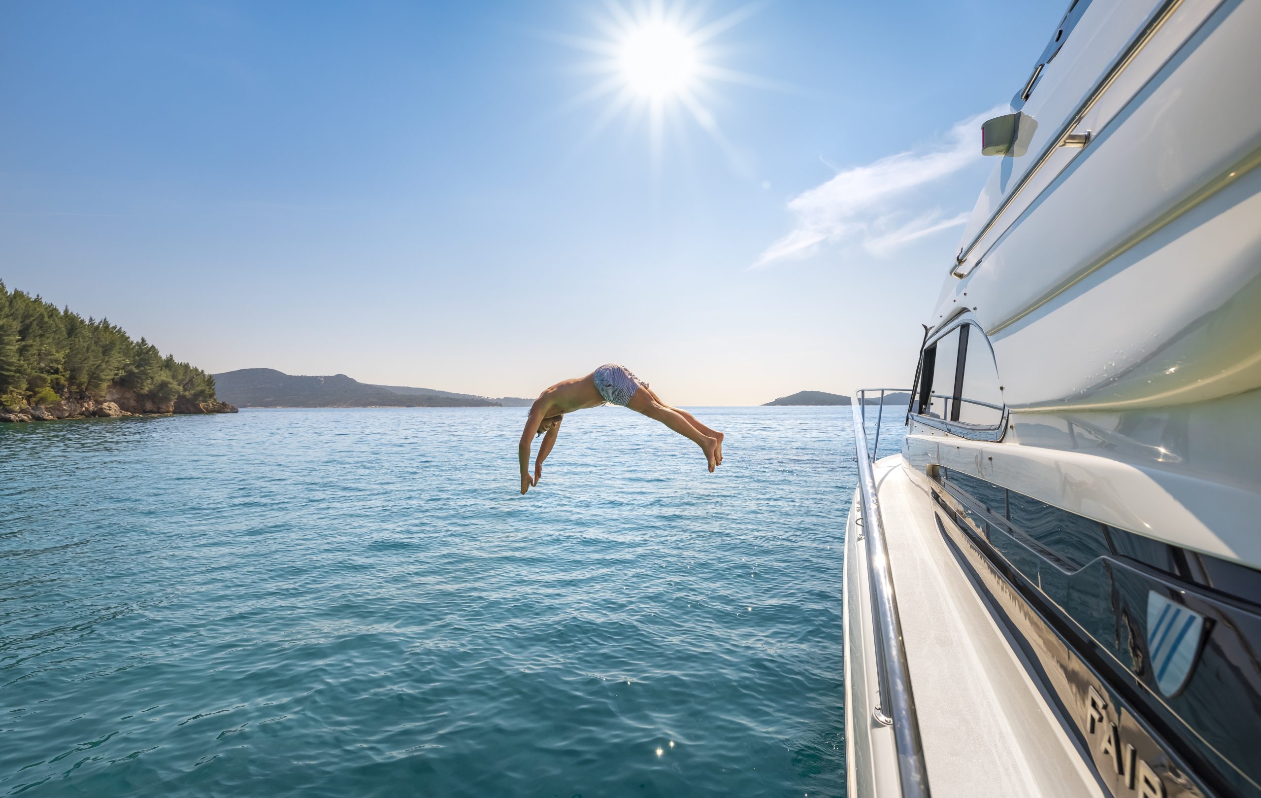 jumping of board a yahct, renting a yacht, yacht charter dubrovnik, dubrovnik yacht rent
