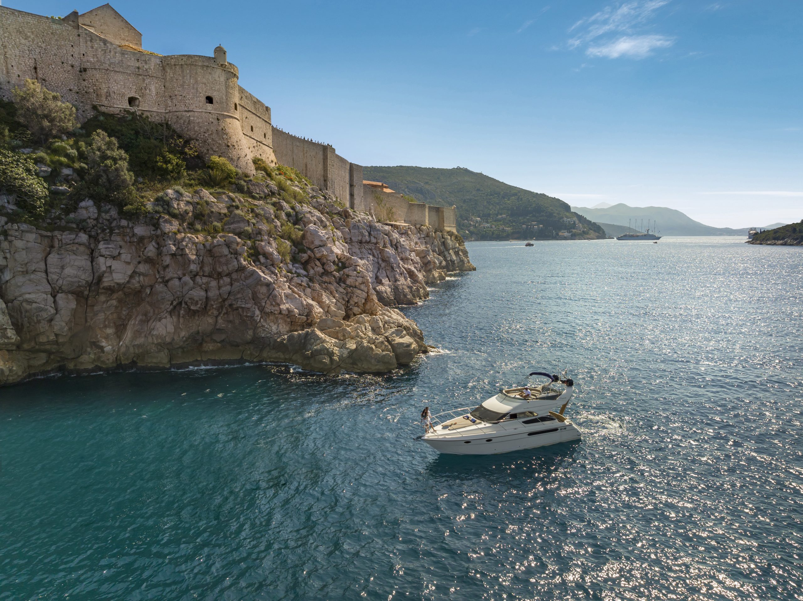 fairline phantom cruising around the old town dubrovnik, dubrovnik old town, dubrovnik lovrijenac, dubrovnik wedding on board, dubrovnik wedding on a yacht, dubrovnik engagement ideas